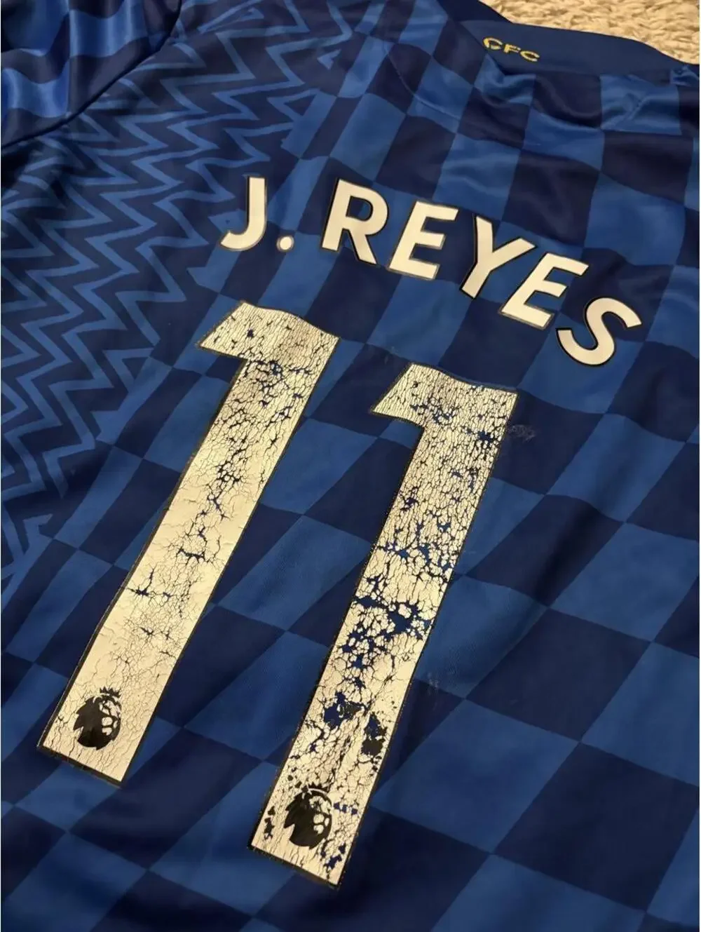 Fire Nike Chelsea 2024/25 home shirt with blue and yellow zigzag pattern